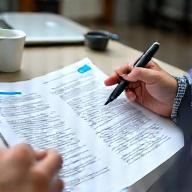 Client reviewing proposal document